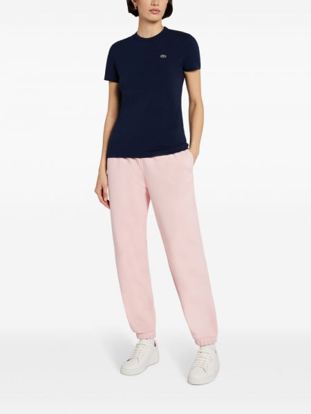Bavlněné kalhoty Lacoste růžové