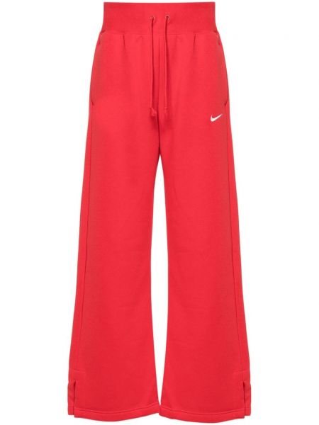 Fleecové sportovní kalhoty Nike červené