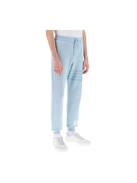 Spodnie sportowe bawełniane Thom Browne niebieskie