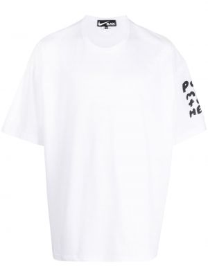 T-shirt avec imprimé slogan à imprimé Black Comme Des Garçons