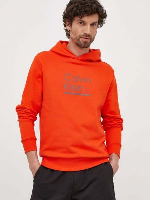 Bavlněná mikina s kapucí s potiskem Calvin Klein oranžová