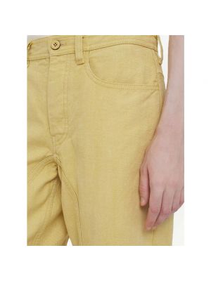 Jeansy z frędzli Jil Sander żółte