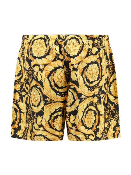 Pantalones cortos de seda Versace dorado