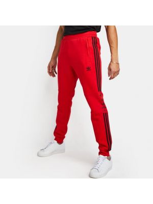 Pantaloni a righe Adidas rosso