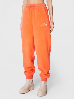 Relaxed fit flisiniai sportinės kelnes Tommy Jeans oranžinė