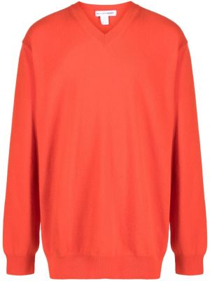 Vilnonis megztinis v formos iškirpte Comme Des Garçons Shirt oranžinė
