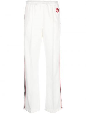 Pruhované teplákové nohavice Gucci biela
