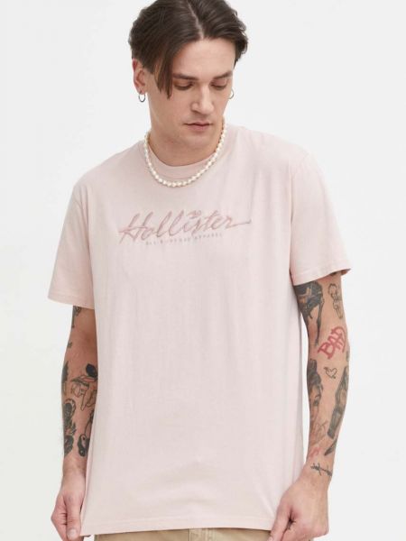 Bavlněné tričko s aplikacemi Hollister Co. růžové