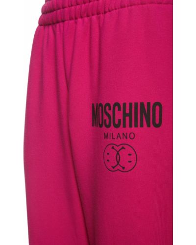 Džerzej bavlnené teplákové nohavice s potlačou Moschino