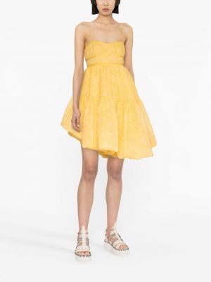 Jedwabna sukienka asymetryczna Cecilie Bahnsen żółta