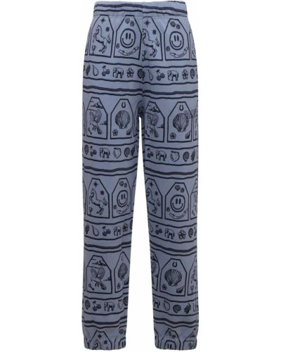 Bavlněné kalhoty jersey Ganni modré