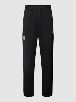 Spodnie sportowe polarowe w paski Adidas czarne