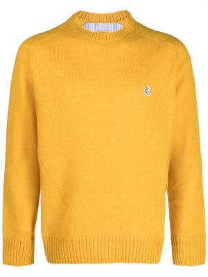 Sweter wełniany Undercover żółty
