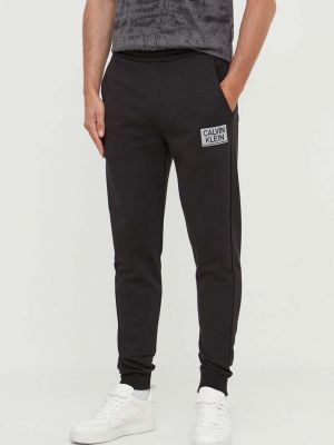 Spodnie sportowe bawełniane Calvin Klein czarne