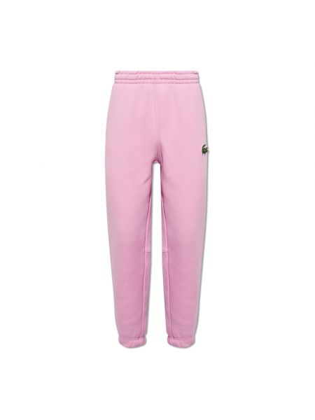 Spodnie sportowe Lacoste różowe