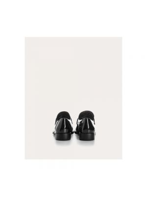 Loafers de cuero Prada negro