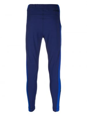 Spodnie sportowe skinny fit z nadrukiem Moncler Grenoble niebieskie