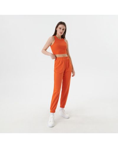 Bavlněné sportovní kalhoty Sinsay - oranžová
