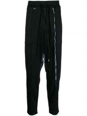 Spodnie sportowe z nadrukiem w kamuflażu Mastermind World czarne