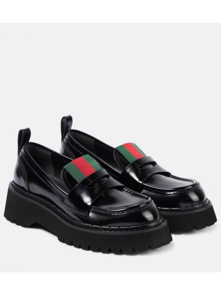 Loafers i läder med mönster i ränder Gucci svart