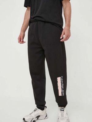 Spodnie sportowe z nadrukiem Calvin Klein Jeans czarne