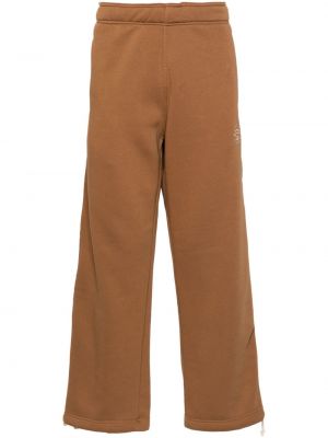 Saténové teplákové nohavice s výšivkou Société Anonyme hnedá