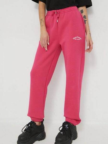 Спортивные штаны Juicy Couture розовые