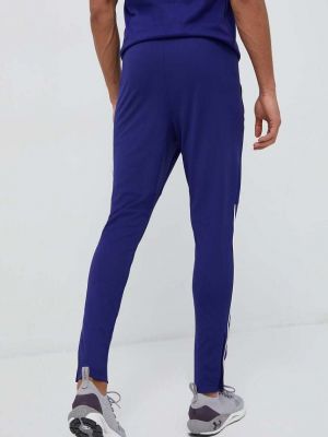 Однотонные спортивные штаны Under Armour фиолетовые