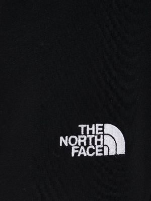 Bavlněné kalhoty The North Face černé
