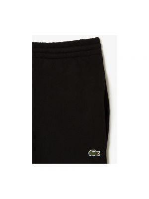 Pantalones de chándal de algodón Lacoste negro