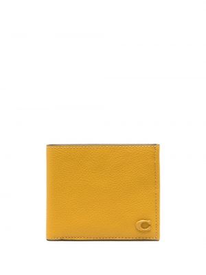Kožená peňaženka Coach žltá