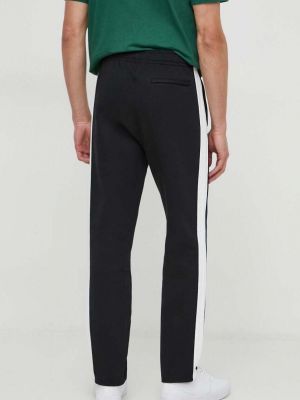 Sportovní kalhoty s aplikacemi Lacoste černé