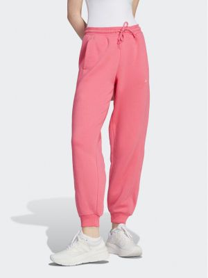 Fleecové sportovní kalhoty relaxed fit Adidas růžové