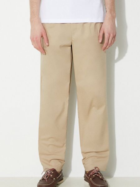 Jednobarevné rovné kalhoty New Balance béžové