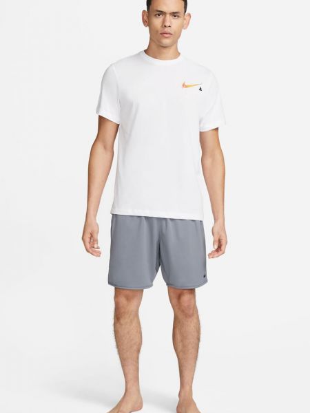 Спортивные штаны с карманами Nike серые