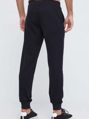 Bavlněné kalhoty s potiskem Emporio Armani Underwear černé
