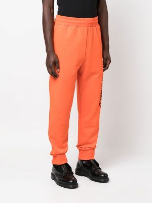 Sportovní kalhoty s potiskem A-cold-wall* oranžové
