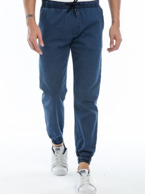 Slim fit teplákové nohavice Slazenger modrá