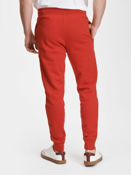 Fleecové sportovní kalhoty Gap červené