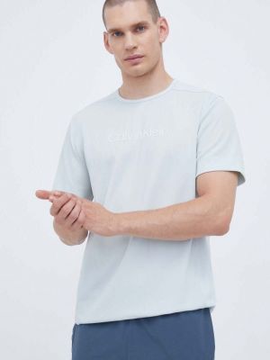 Koszulka z nadrukiem Calvin Klein Performance niebieska