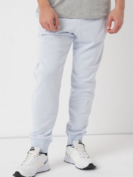 Спортивные штаны слим с карманами Nike синие