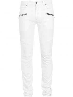 Jeansy skinny z niską talią slim fit bawełniane Balmain białe