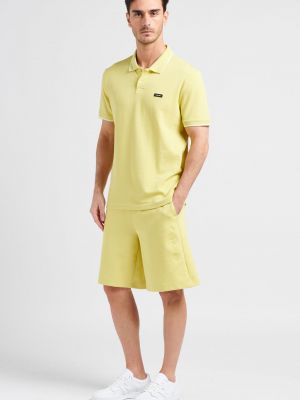 Желтые спортивные шорты Calvin Klein