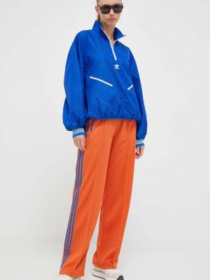 Sportovní kalhoty Adidas Originals oranžové