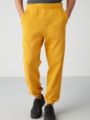 Teplákové nohavice Grimelange žltá