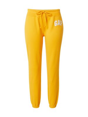 Teplákové nohavice Gap žltá