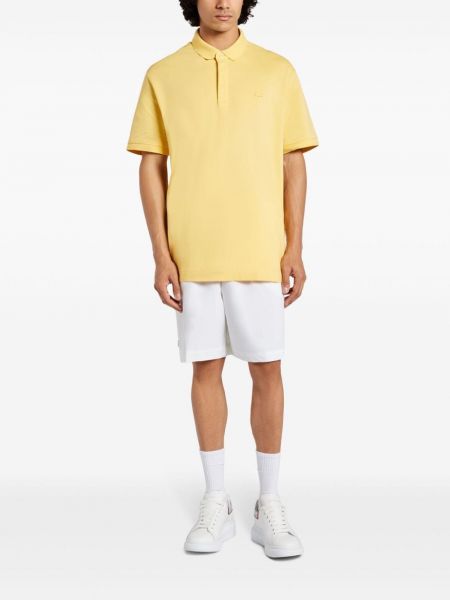 Medvilninis polo marškinėliai Lacoste geltona