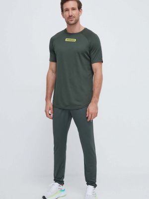 Spodnie sportowe z nadrukiem Hummel zielone
