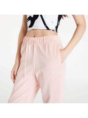 Αθλητικό παντελόνι από ζέρσεϋ Nike ροζ