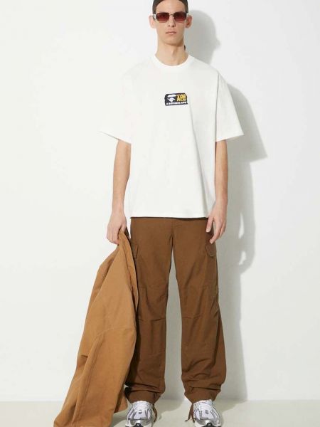 Jednobarevné bavlněné cargo kalhoty Carhartt Wip hnědé